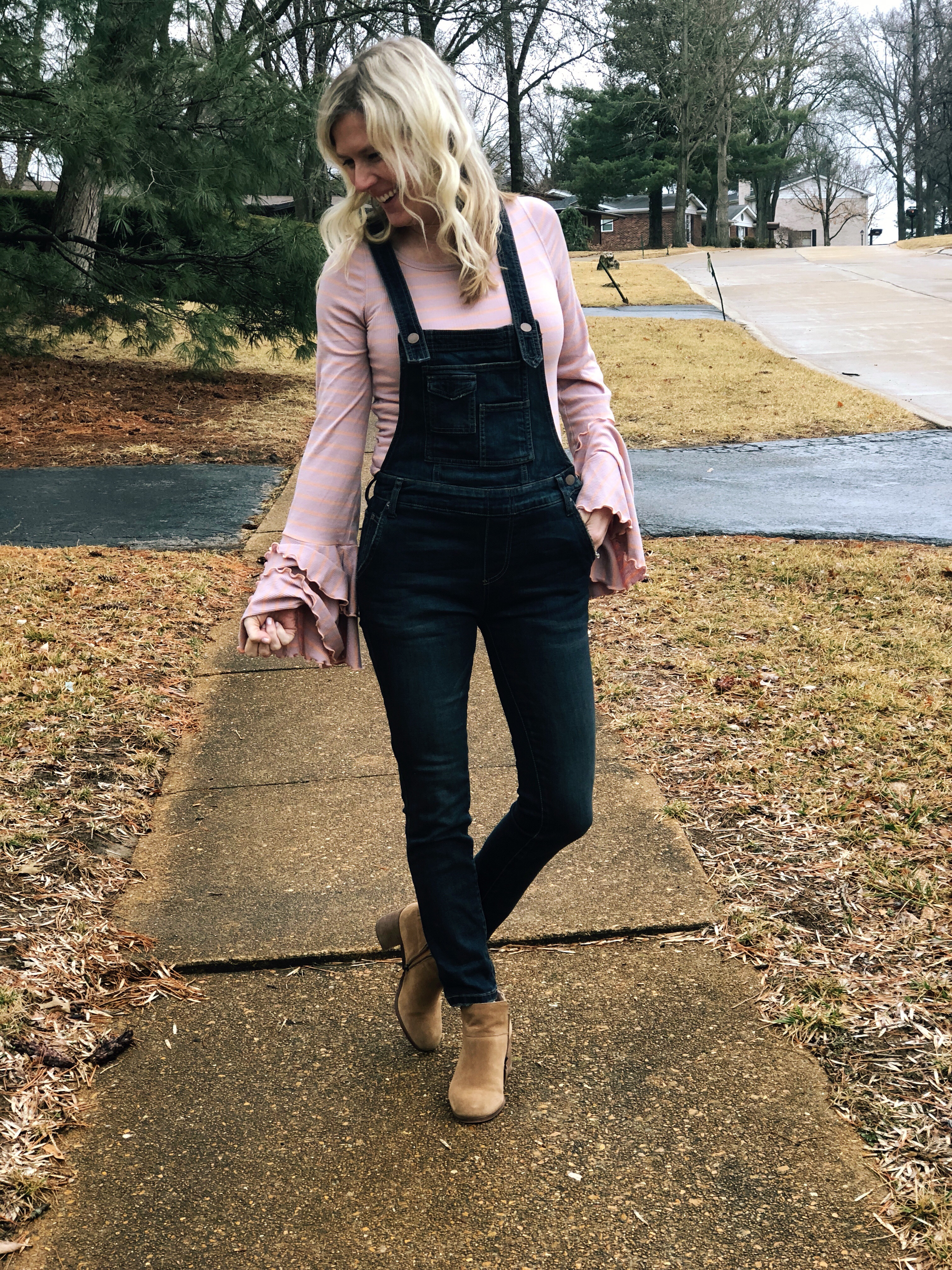 free people we the free good find top | How to style Free People Overalls featured by top Missouri fashion blogger, Emmy Lou Styles: with a striped top