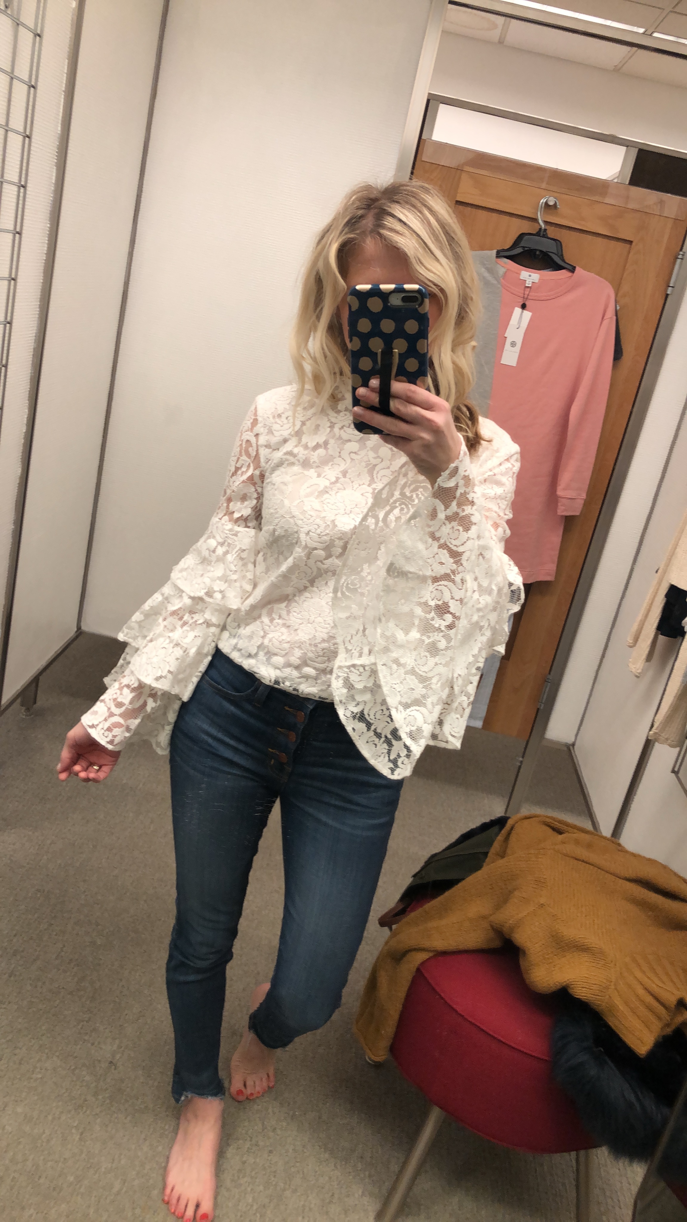 Nordstrom Try on Session featured by top Missouri fashion blogger, Emmy Lou Style: image of a woman wearing a ruffle sleeve lace top