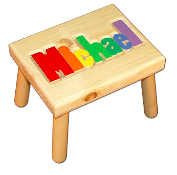 Emily from Emmy Lou Styles shares her gift guide for kids which includes this personalized name stepstool.