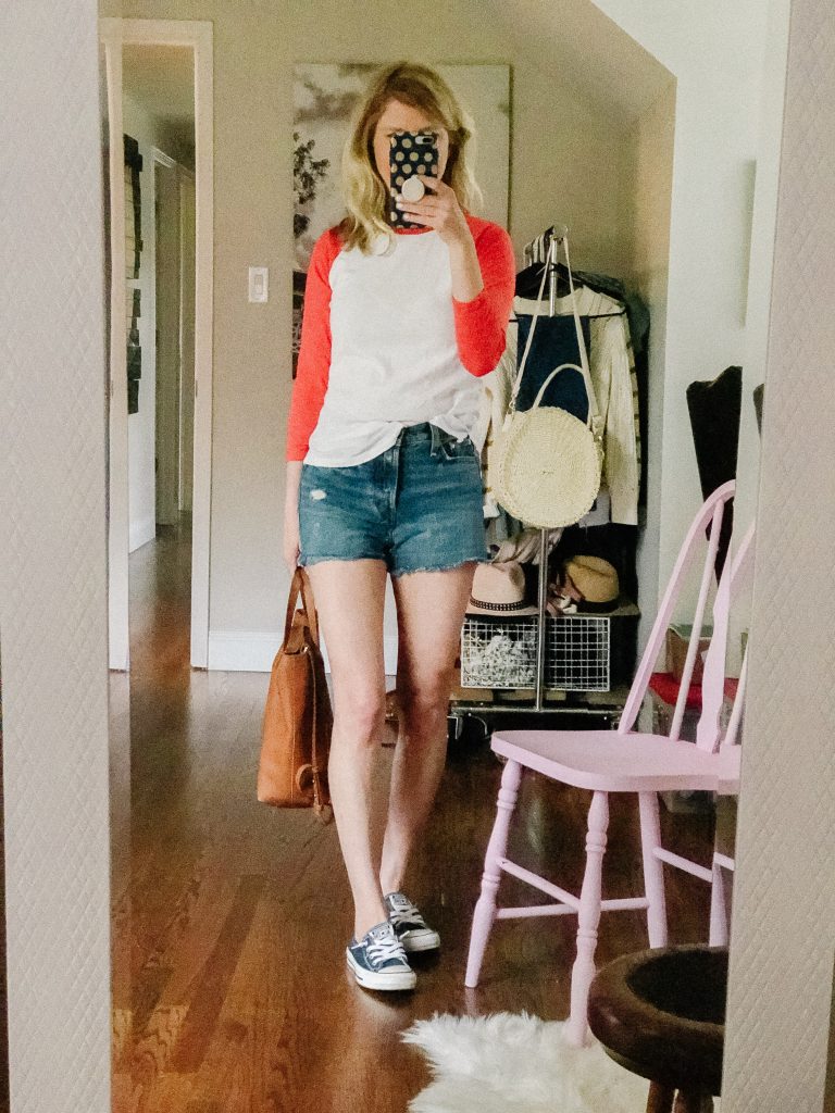 how to style denim shorts for a baseball game