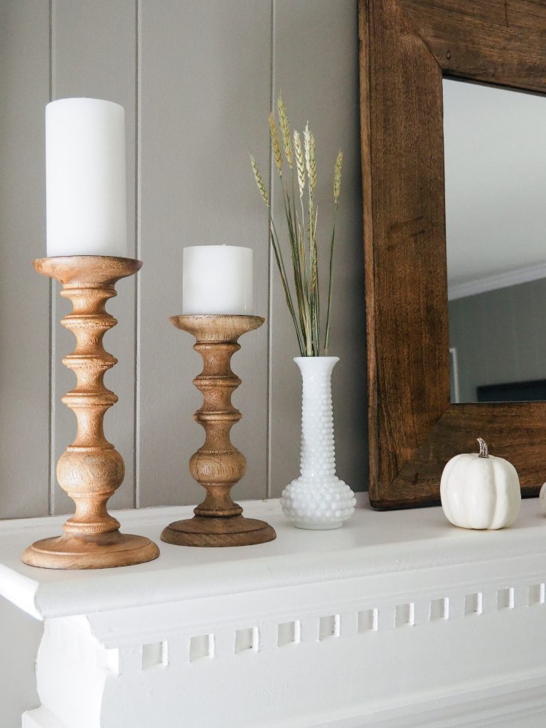 Simple fall mantle featuring wooden candlesticks