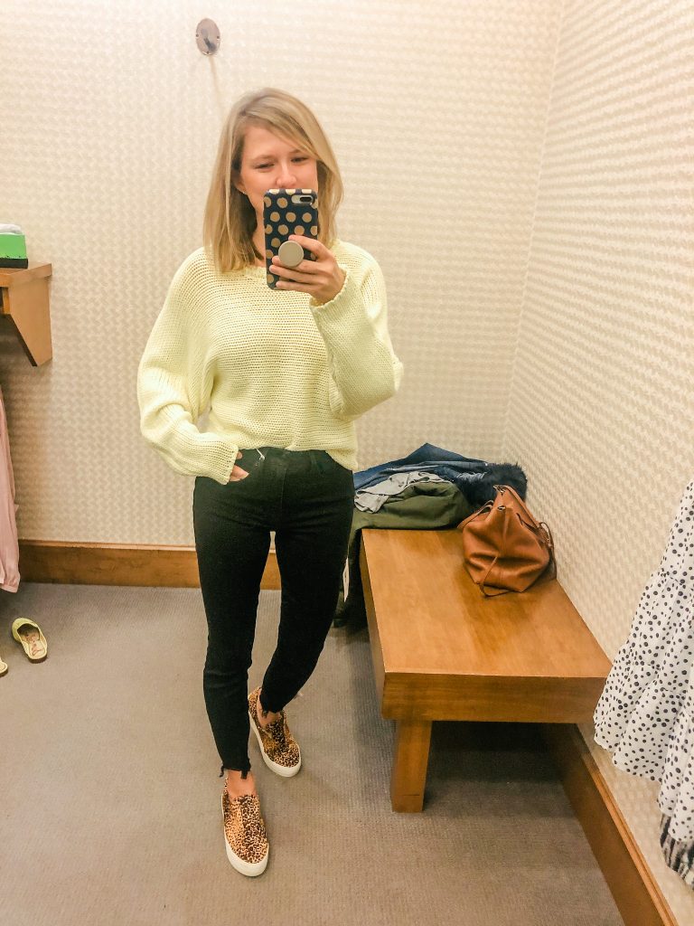 Photo of woman wearing bright yellow spring sweater from Evereve new arrivals