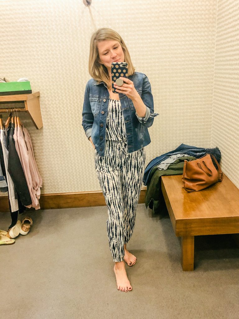 Photo of woman wearing tiedye jumpsuit and denim jacket from Evereve