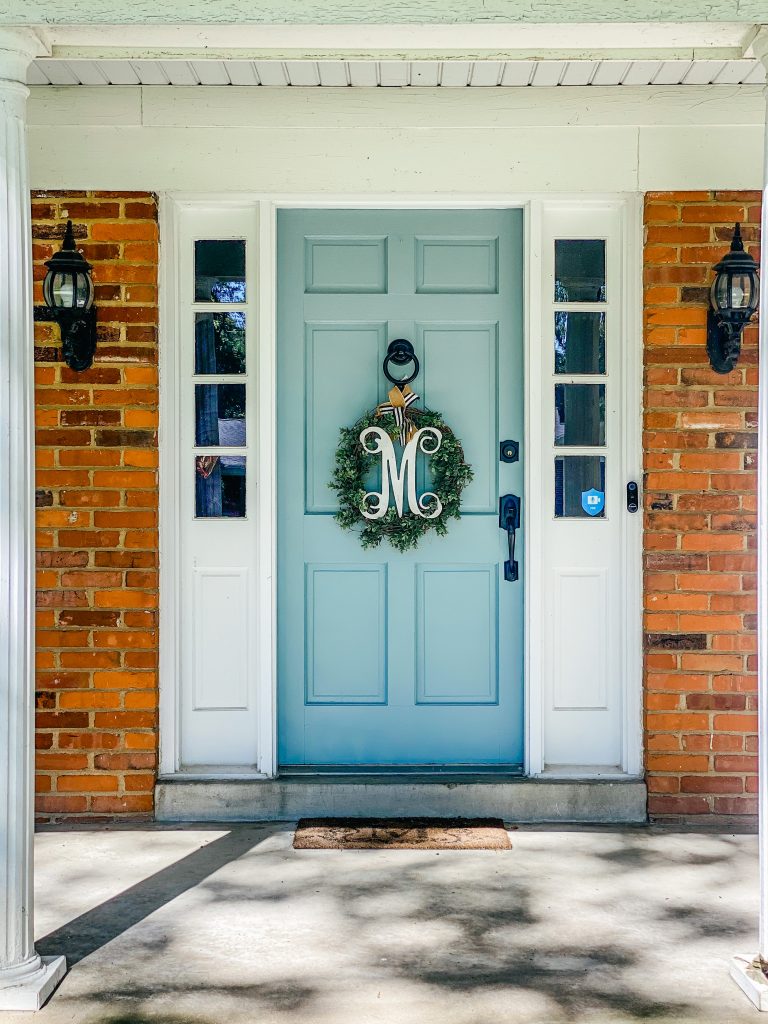 Wythe blue on a front door next to orange brick